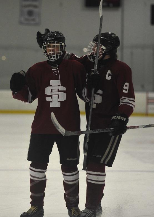 Senior Jack Connelly and Sophomore Patrick Doyle celebrating a goal. 