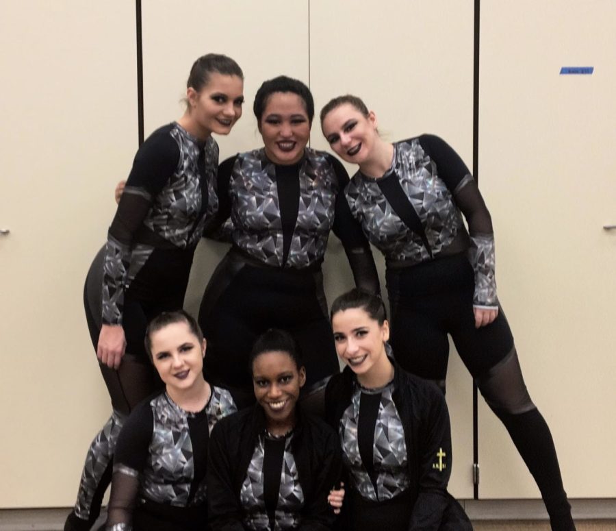 Some SICP dance team seniors commemorate their last first competition. 