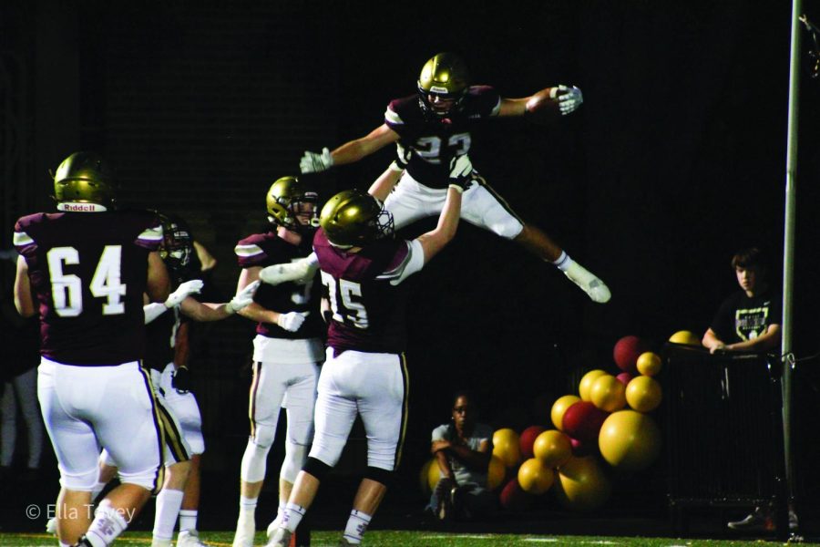 Will Mulchrone ‘22 celebrates with Vinny Rugai ‘23 after a touchdown. Courtesy of Ella Tovey.