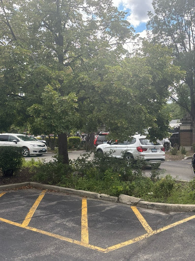 Students rush to get a spot in the in the line to exit 
the parking lot at 3pm.
